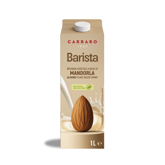 A 1-liter carton of Carraro 1927 Barista Almond plant-based milk, featuring a single almond splashing into creamy milk.
