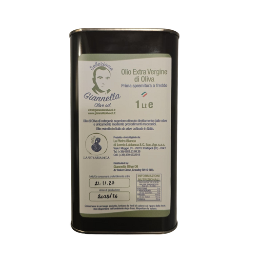 A dark metal tin of Giennella Virgin Olive Oil on a plain white background.